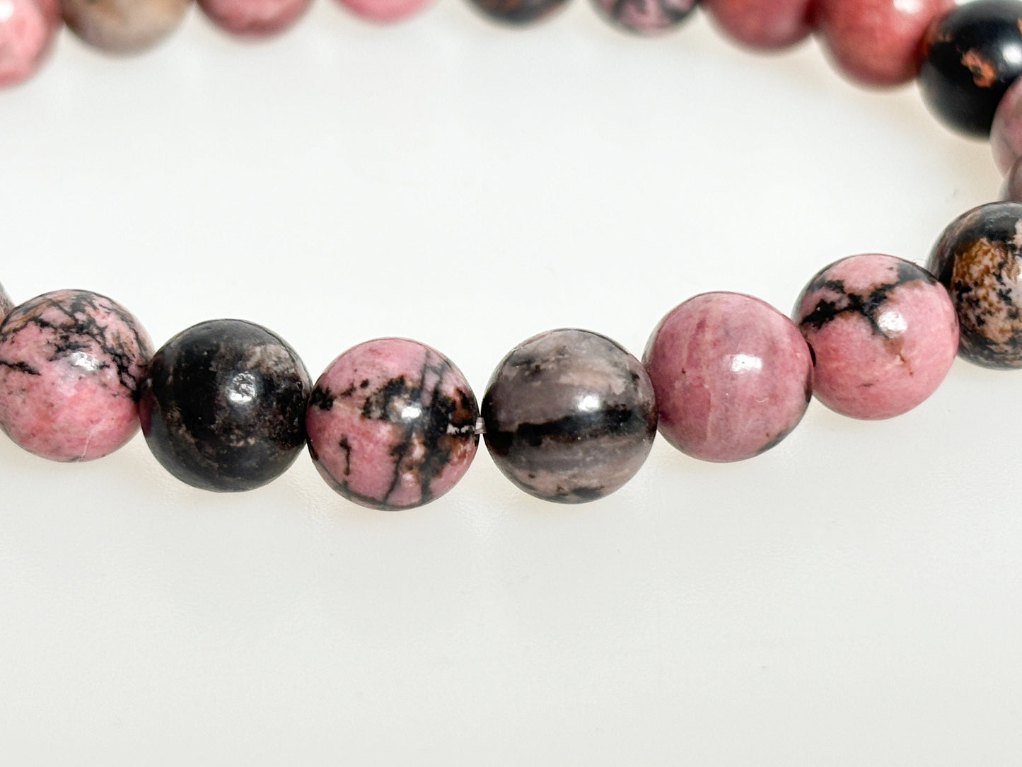 Rhodonite bracelet elastic|healing|heart chakra| 8mm beads| healing stone| gemstone| pink | black