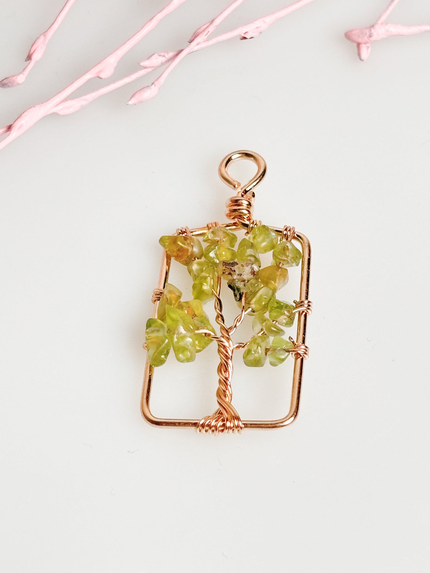Tree of Life pendant with peridot: symbol of connection and vitality