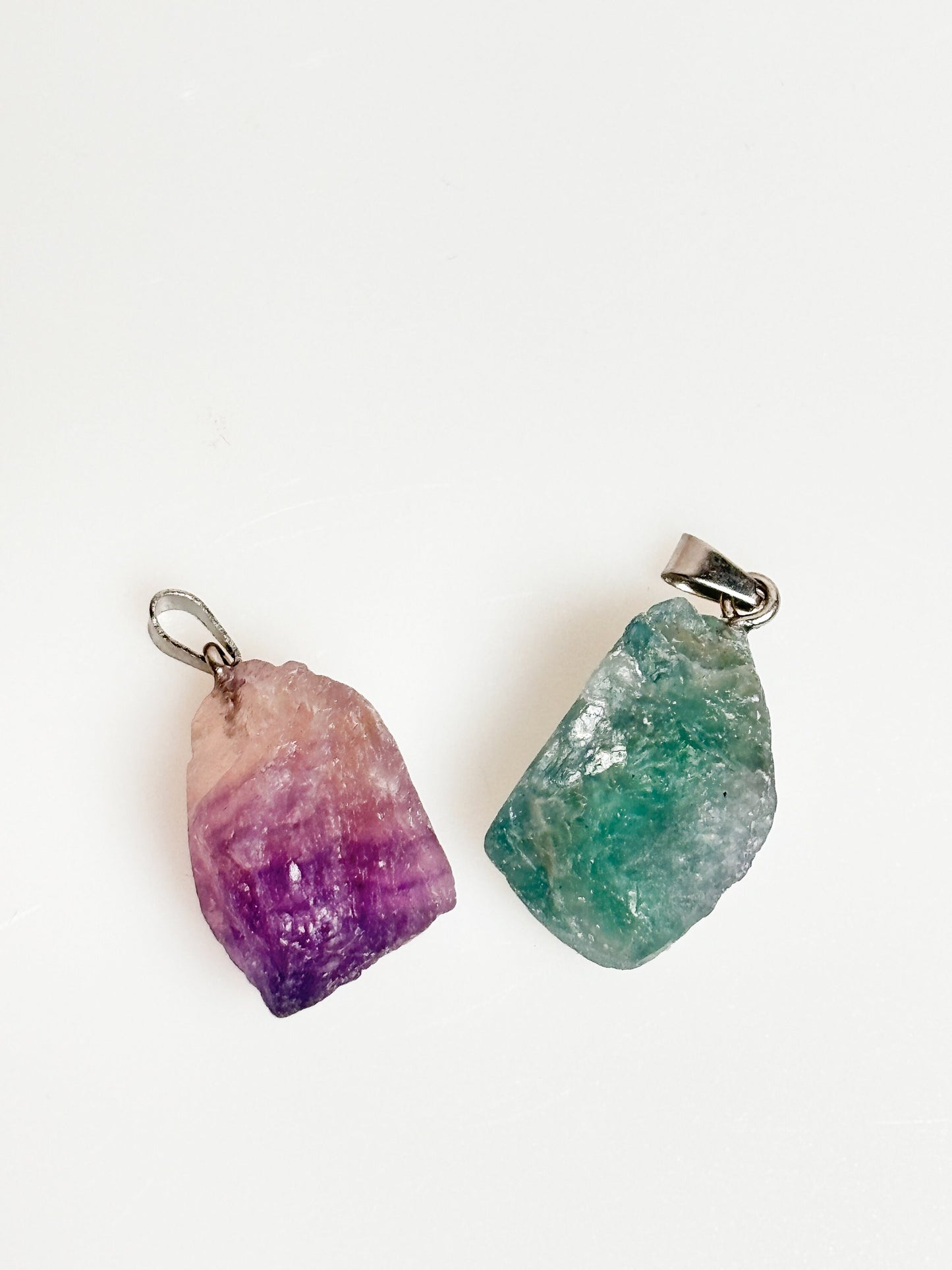 Fluorite raw stone pendant with silver eyelet - size approx. 2.4x1.7cm
