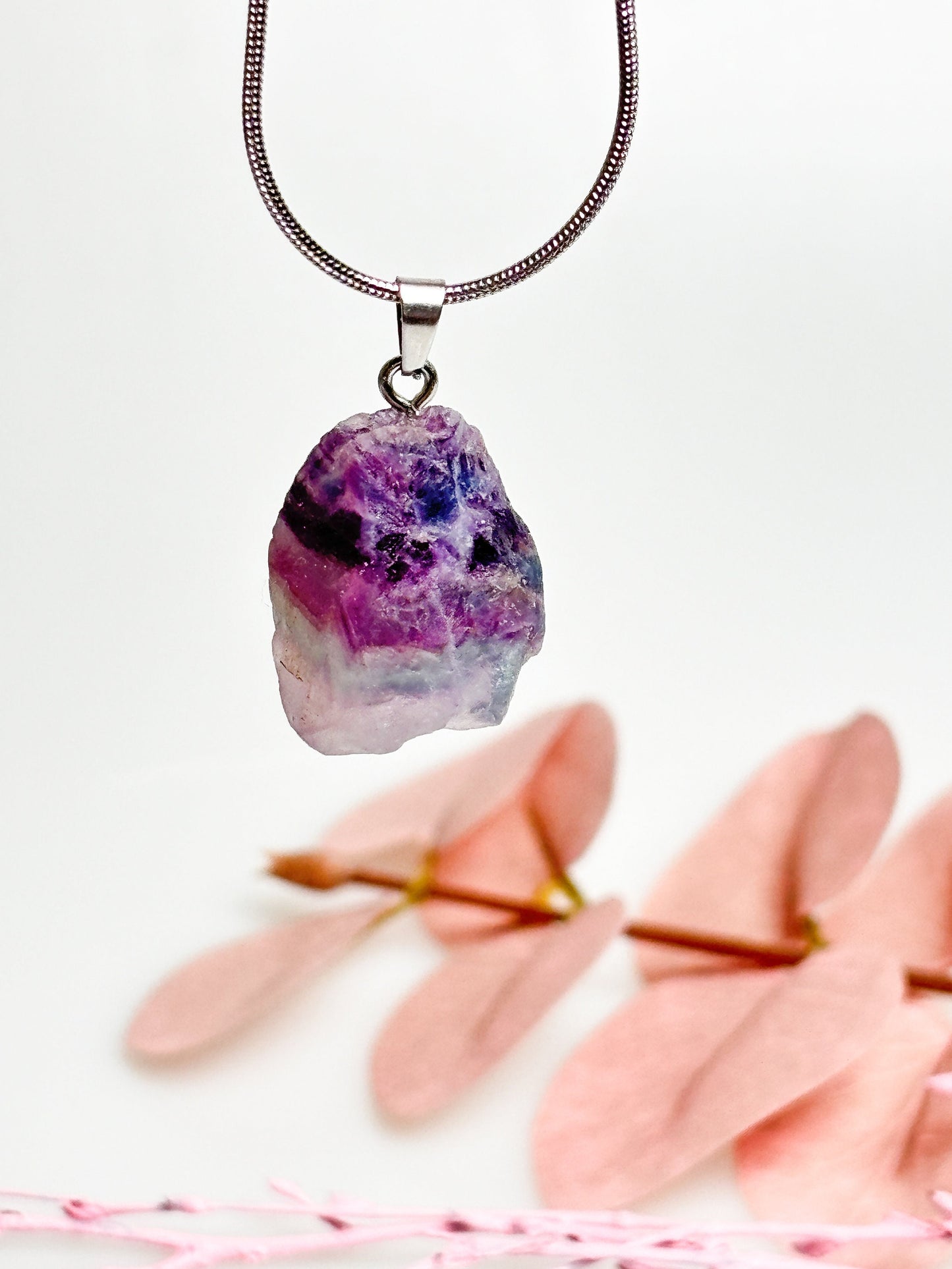 Fluorite raw stone pendant with silver eyelet - size approx. 2.4x1.7cm