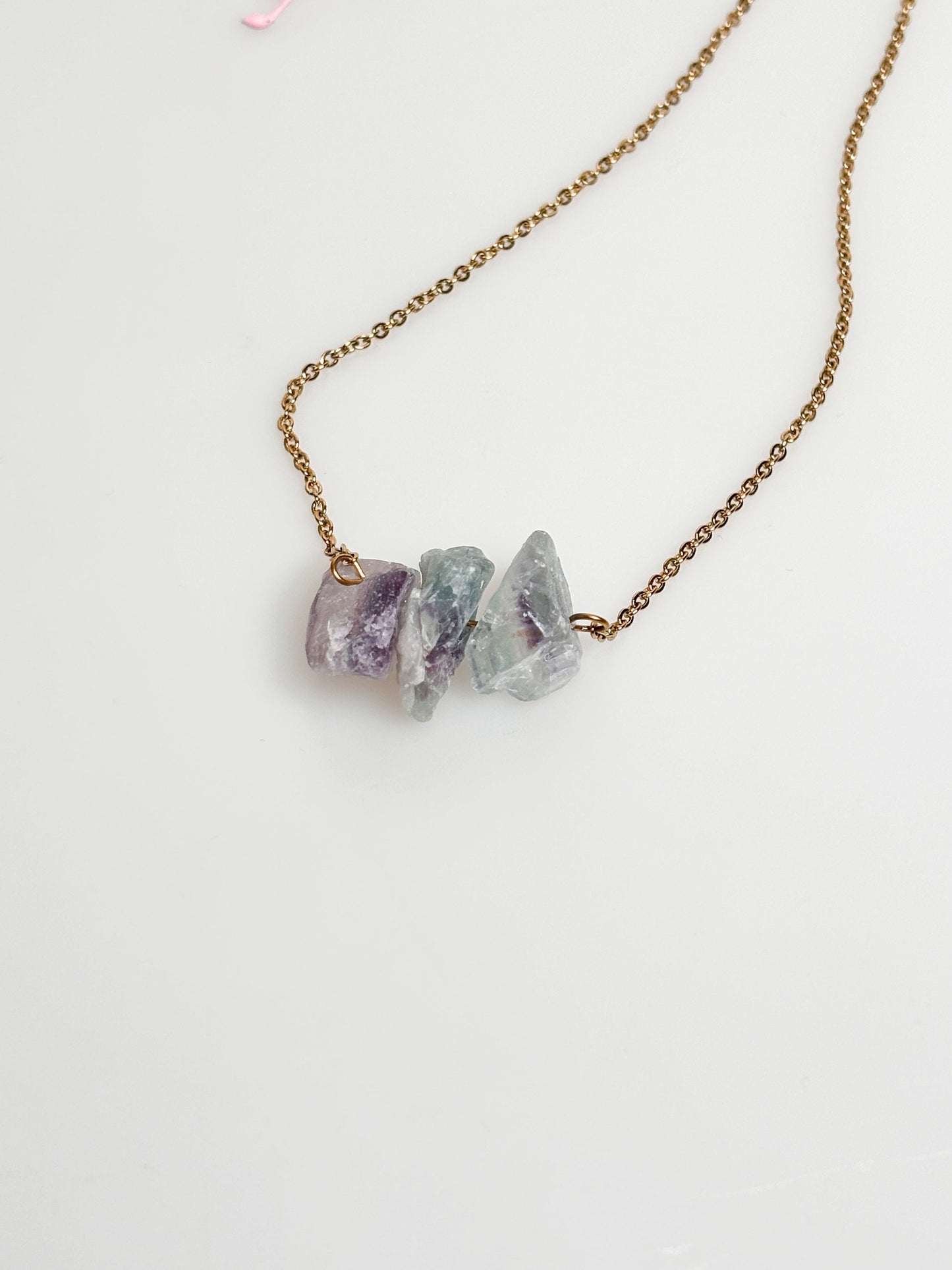 Rainbow fluorite raw stone necklace in gold | stainless steel