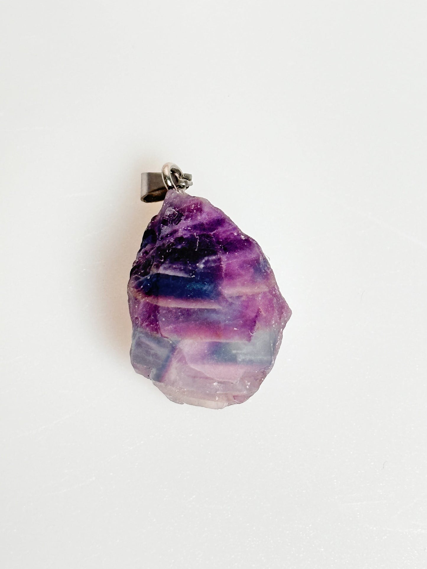 Fluorite raw stone pendant with silver eyelet - size approx. 2.4x1.7cm