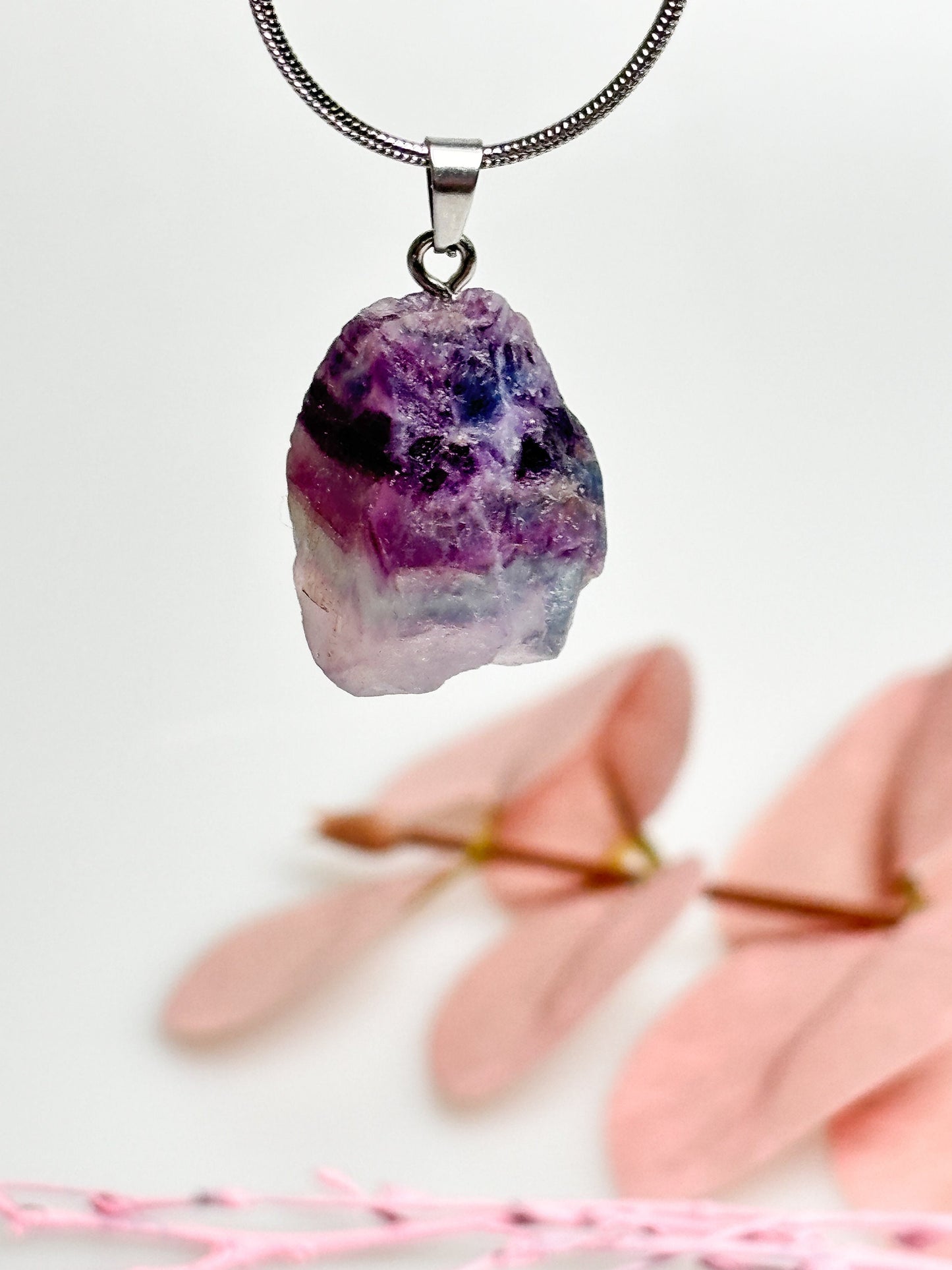 Fluorite raw stone pendant with silver eyelet - size approx. 2.4x1.7cm