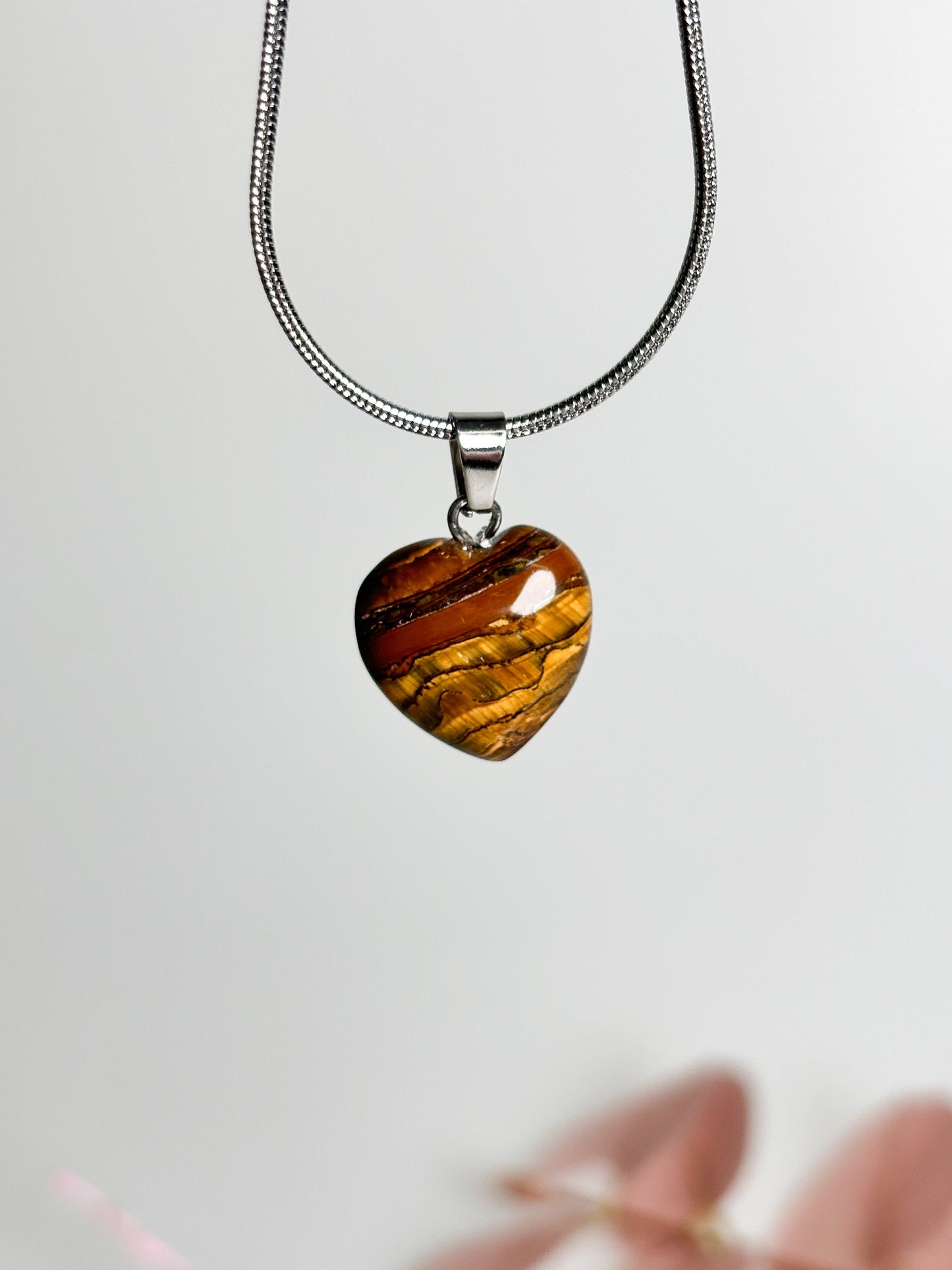 Heart-shaped tiger eye pendant - brings courage and self-confidence