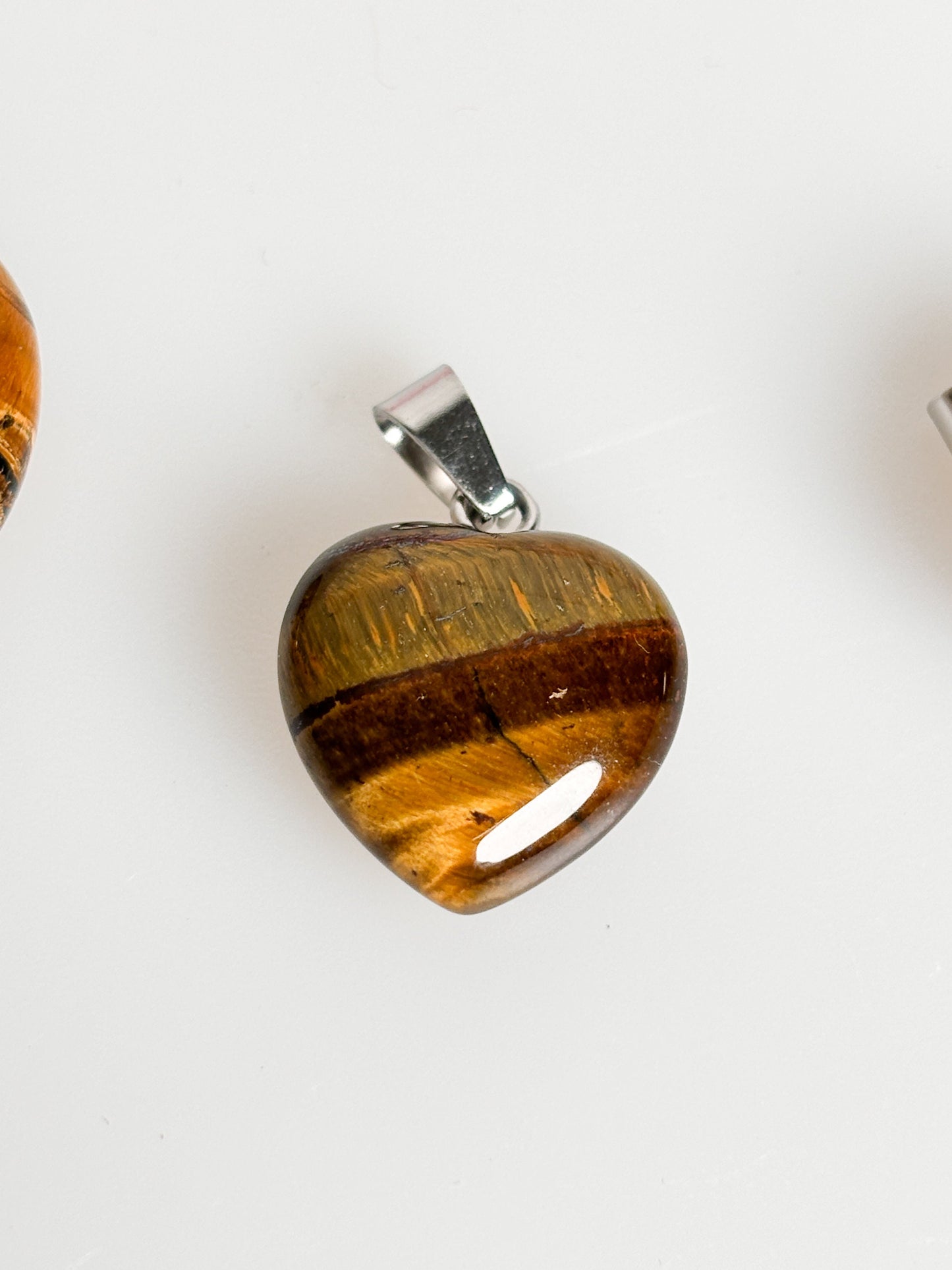 Heart-shaped tiger eye pendant - brings courage and self-confidence