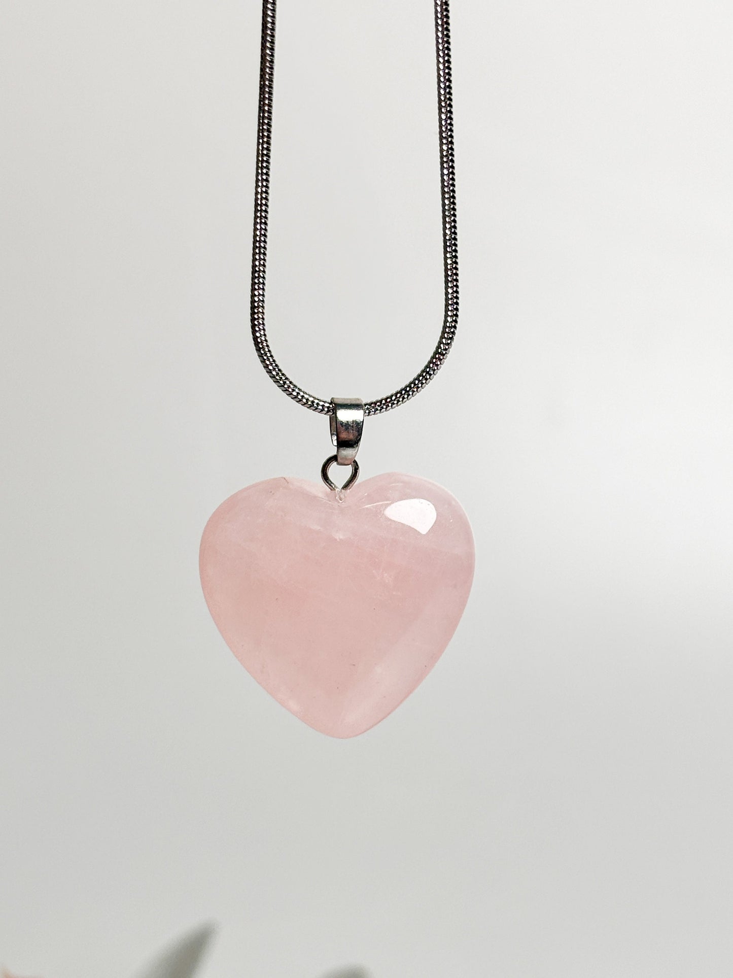 Natural beauty: rose quartz pendant with silver eyelet