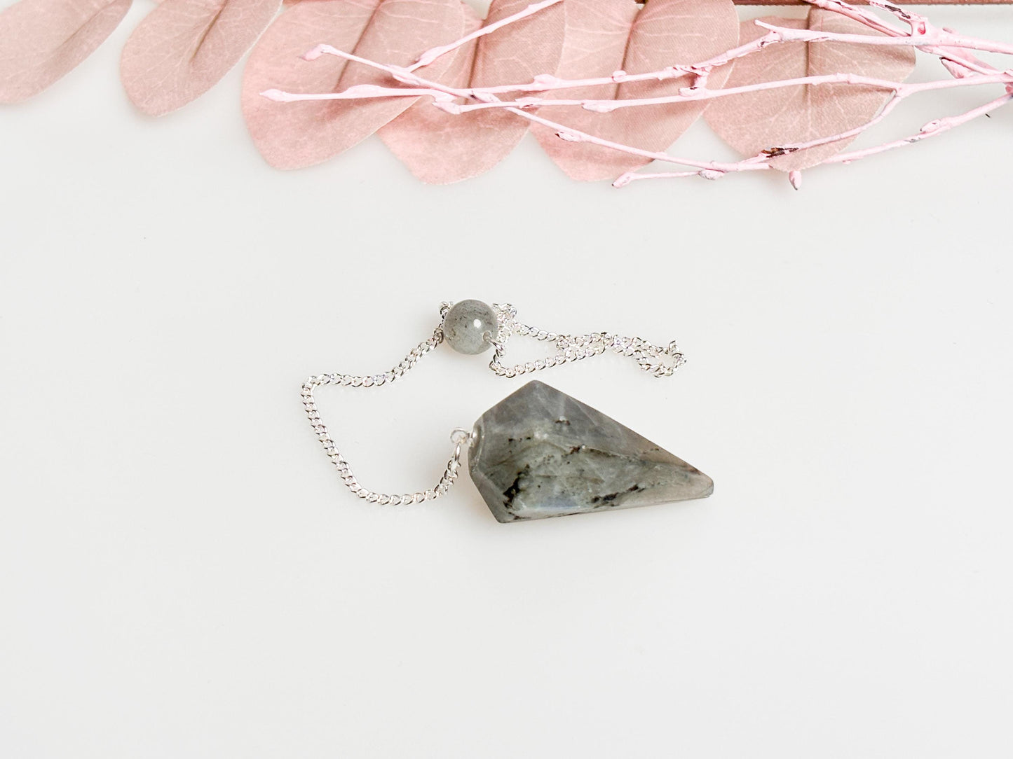 Flashy Labradorite pendulum on chain - beautiful healing stone jewelry for energy work, meditation and esotericism.