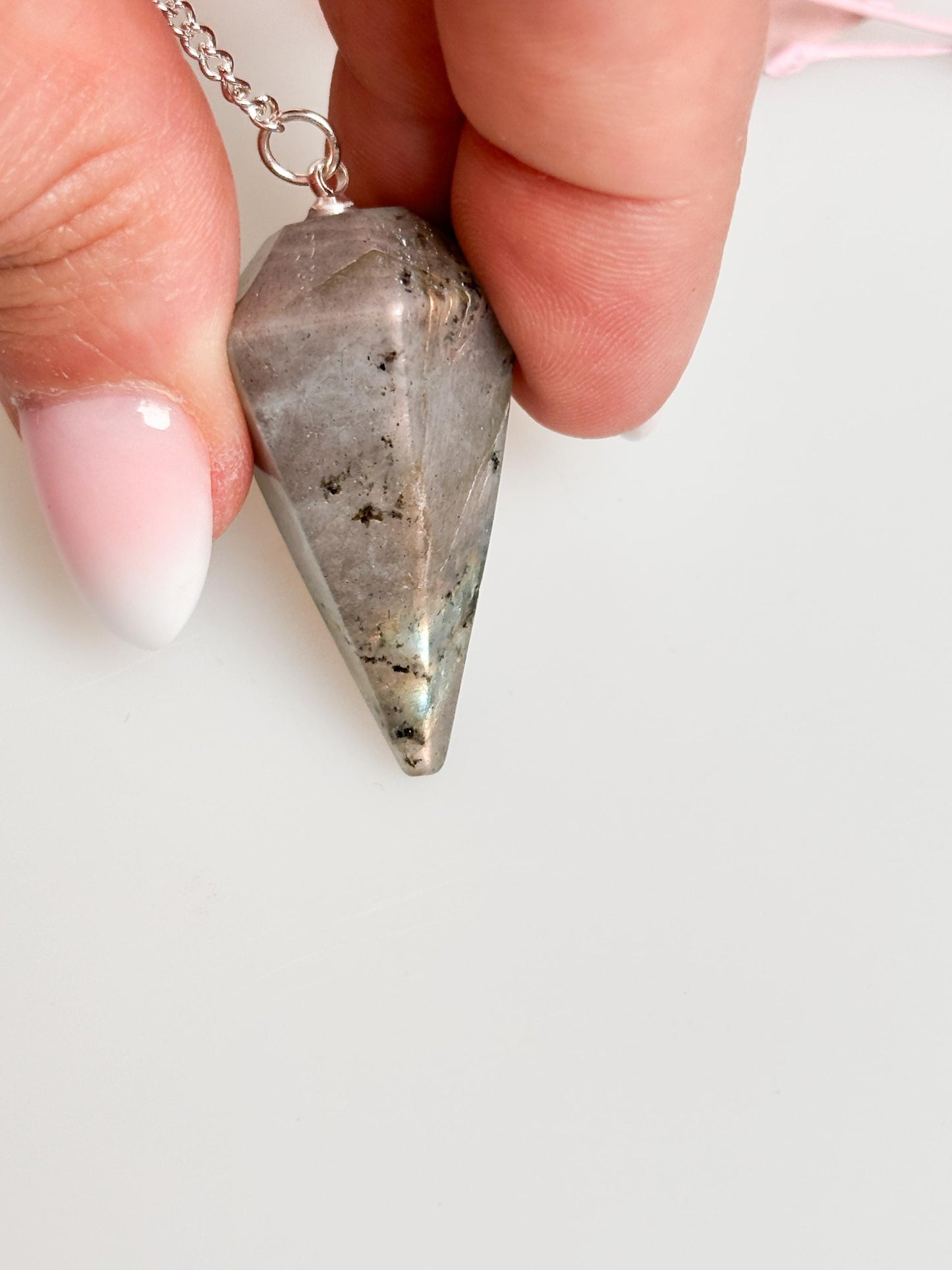 Flashy Labradorite pendulum on chain - beautiful healing stone jewelry for energy work, meditation and esotericism.