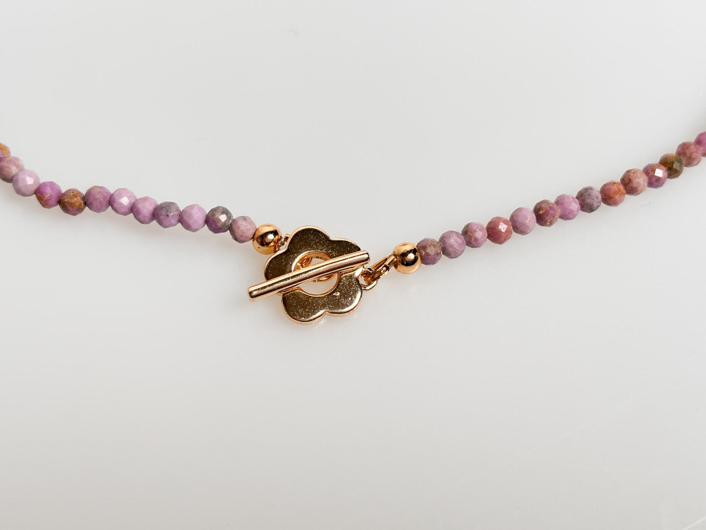 Delicate pearl necklace made of faceted 3.5mm phosphorsiderite beads with toggle clasp