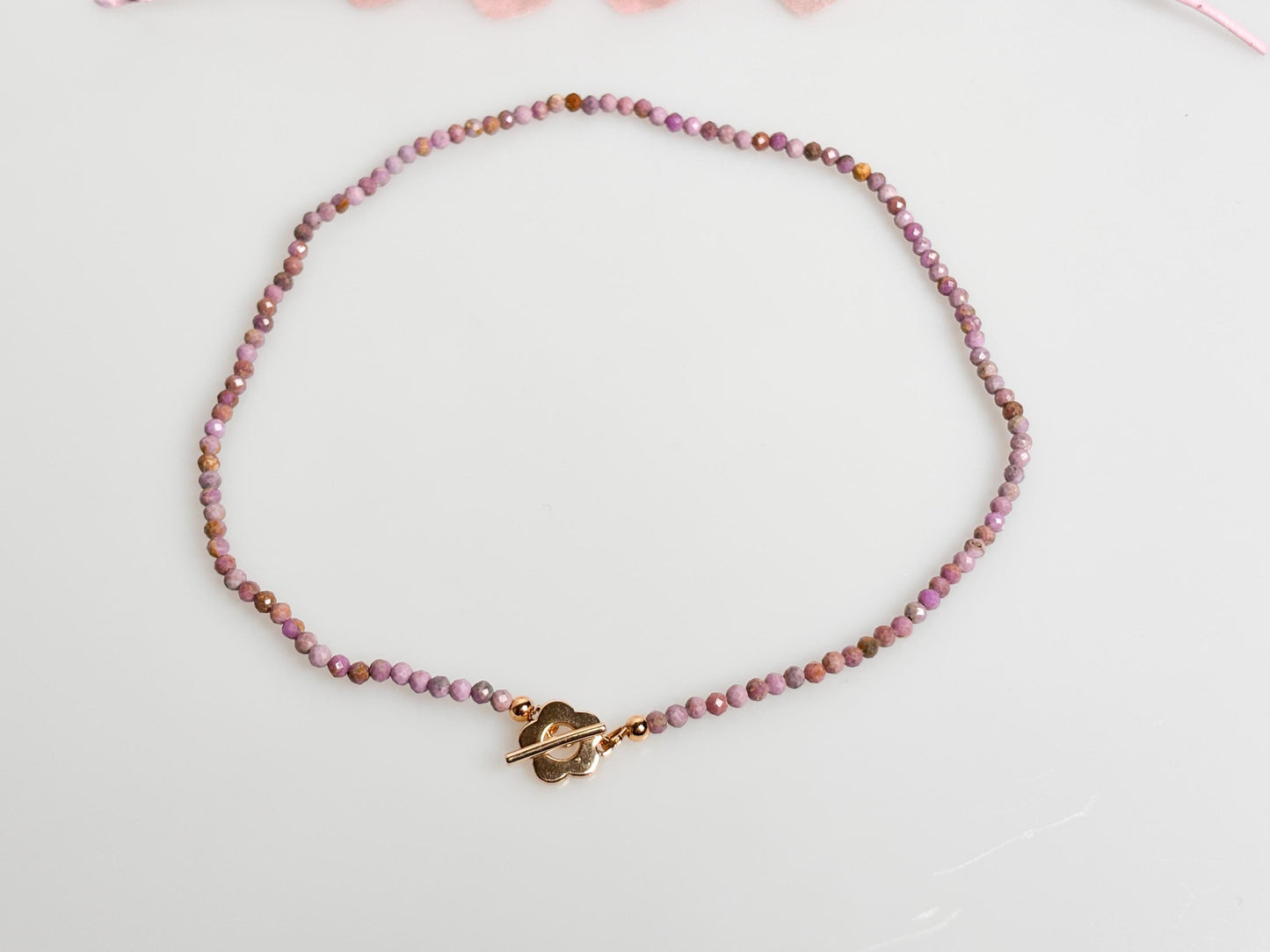 Delicate pearl necklace made of faceted 3.5mm phosphorsiderite beads with toggle clasp
