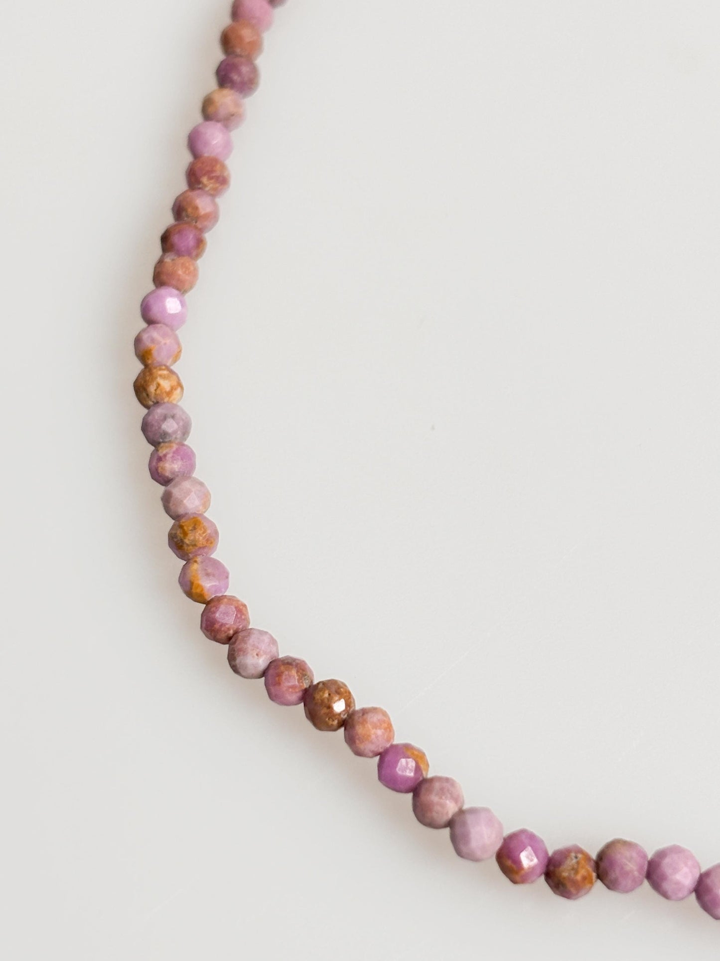 Delicate pearl necklace made of faceted 3.5mm phosphorsiderite beads with toggle clasp