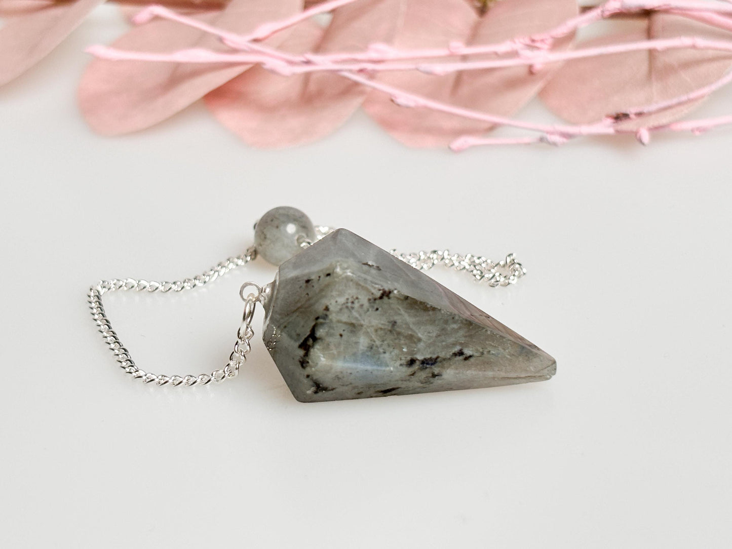 Flashy Labradorite pendulum on chain - beautiful healing stone jewelry for energy work, meditation and esotericism.