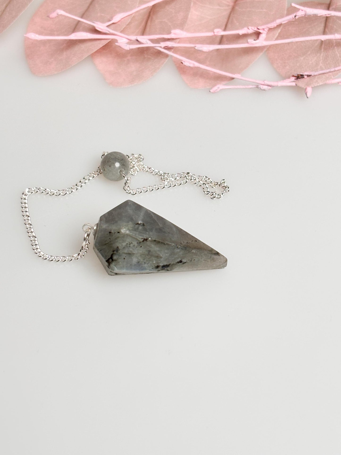 Flashy Labradorite pendulum on chain - beautiful healing stone jewelry for energy work, meditation and esotericism.