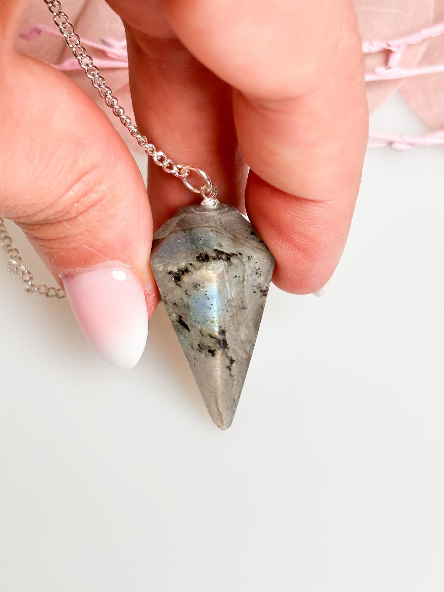Flashy Labradorite pendulum on chain - beautiful healing stone jewelry for energy work, meditation and esotericism.