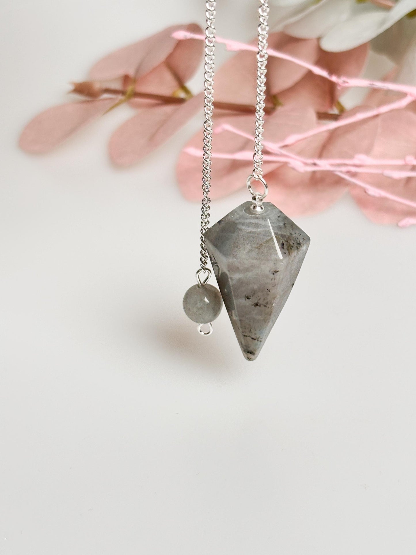 Flashy Labradorite pendulum on chain - beautiful healing stone jewelry for energy work, meditation and esotericism.