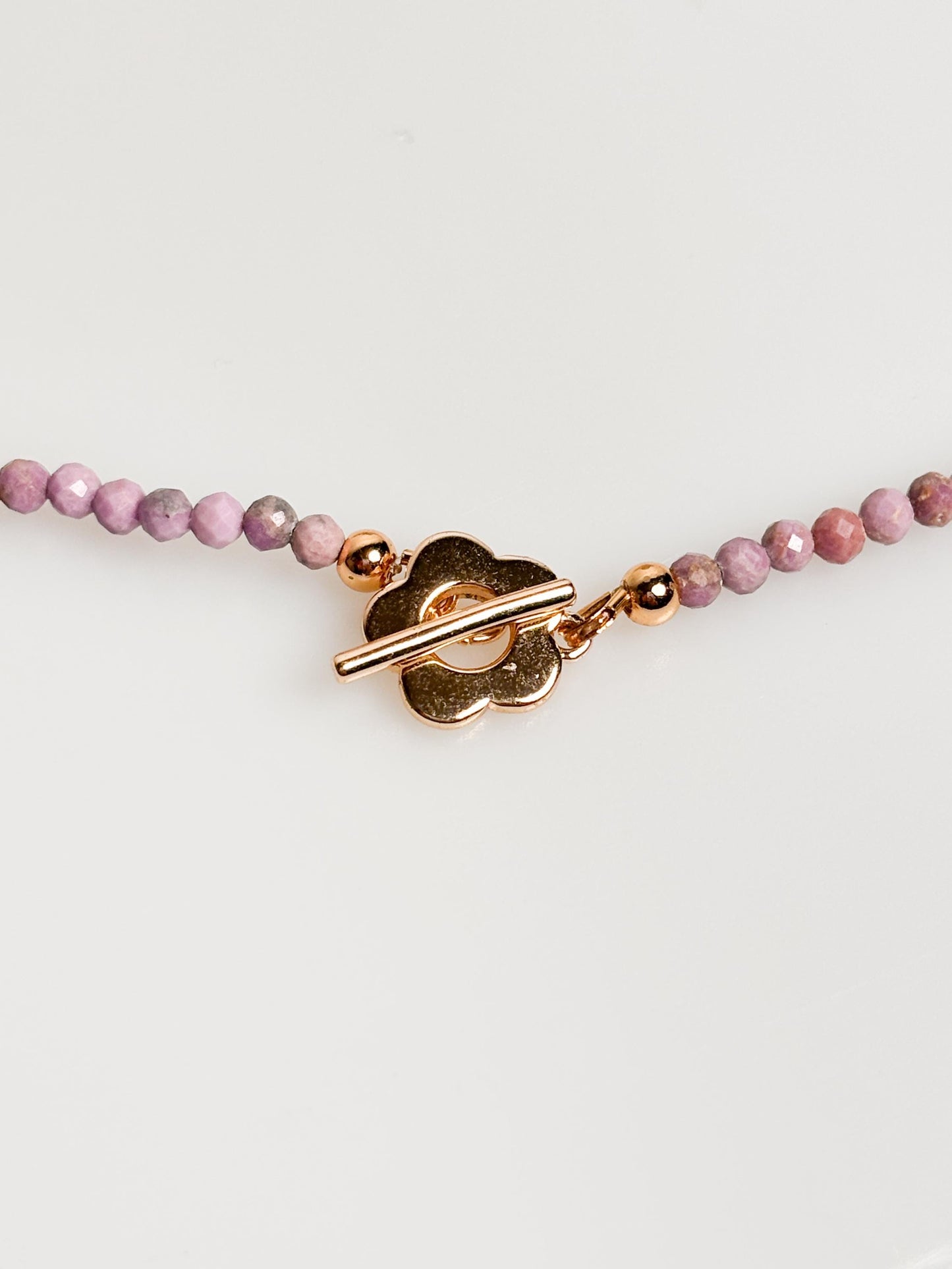 Delicate pearl necklace made of faceted 3.5mm phosphorsiderite beads with toggle clasp