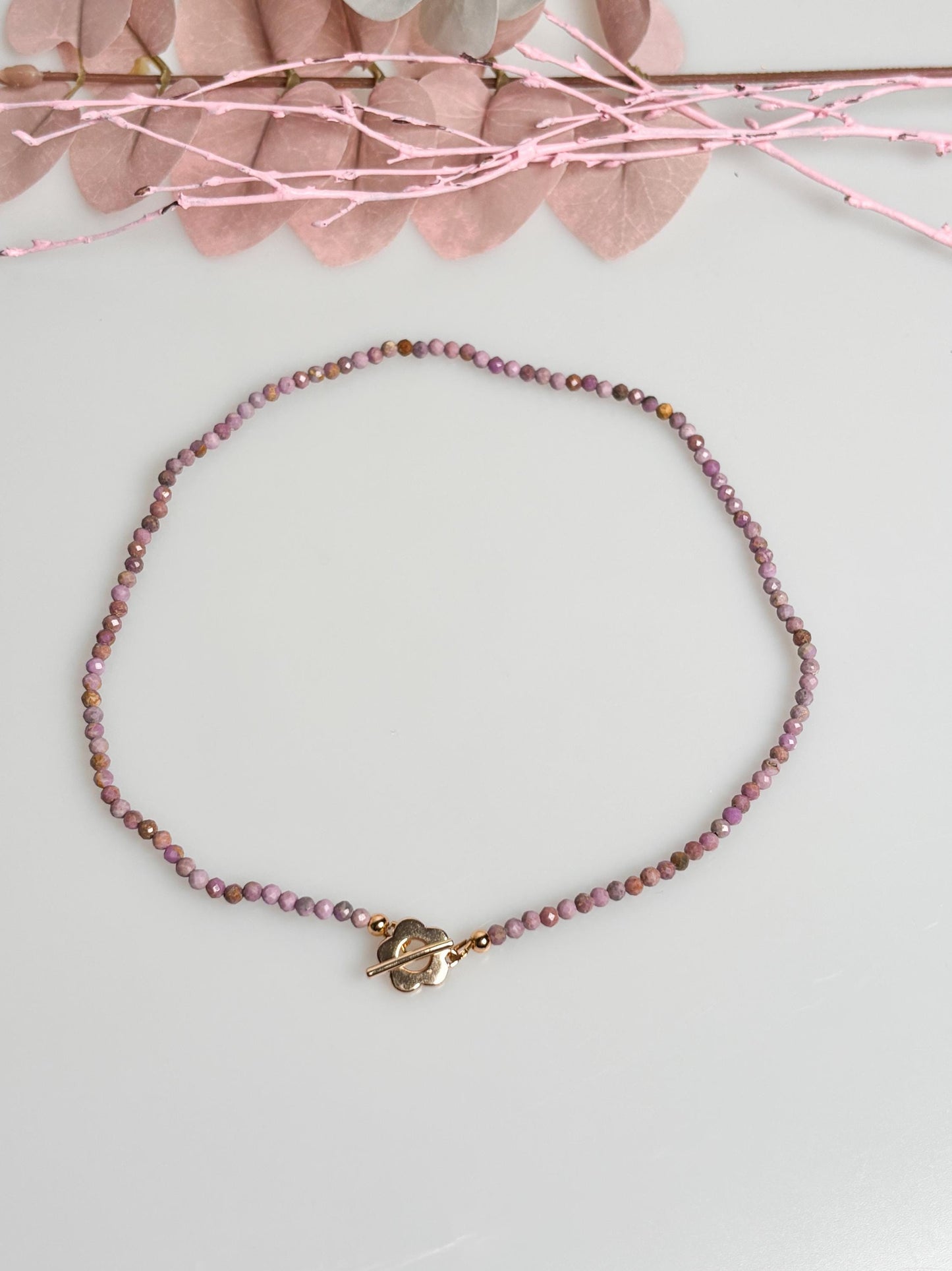Delicate pearl necklace made of faceted 3.5mm phosphorsiderite beads with toggle clasp
