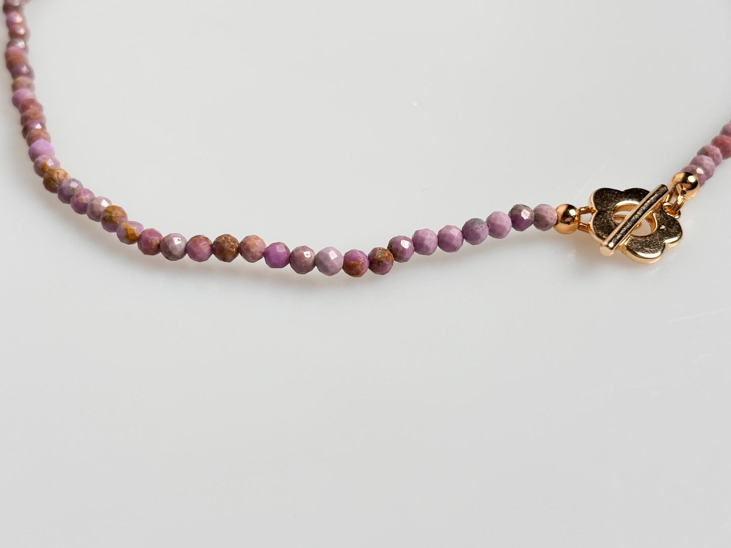 Delicate pearl necklace made of faceted 3.5mm phosphorsiderite beads with toggle clasp
