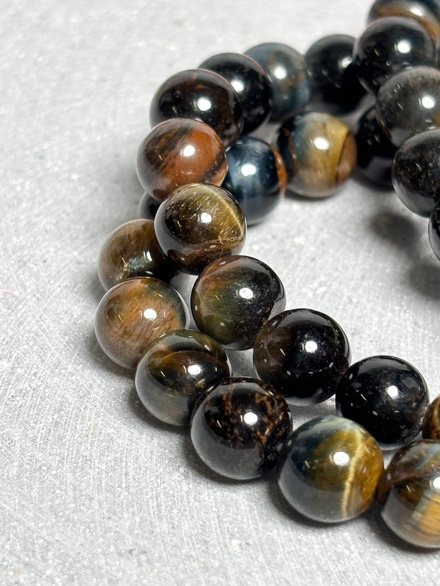 Tigerauge Armband elastisches Perlenarmband ca. 17,5 cm mit 8 mm runden Perlen, Edelstein Schmuck mit schönem Schimmer