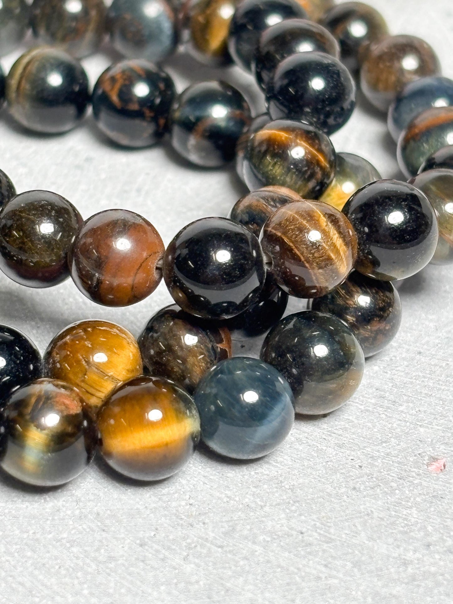 Tigerauge Armband elastisches Perlenarmband ca. 17,5 cm mit 8 mm runden Perlen, Edelstein Schmuck mit schönem Schimmer