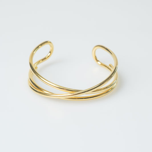 Eleganter Armreif aus Edelstahl – 18k vergoldet, verschlungenes Design