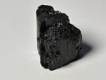 Schwarzer Turmalin Rohstein Naturstein schwarz roh